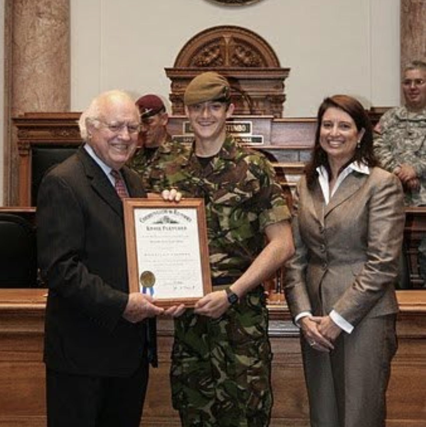 Cam in Army Cadets uniform receiving his Kentucky Colonel certificate